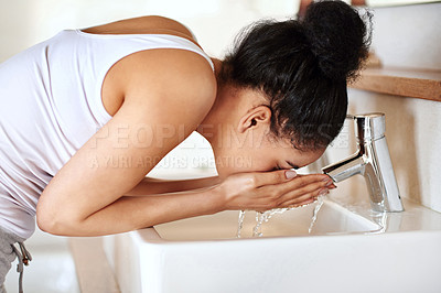 Buy stock photo Woman, bathroom and sink for washing face, skincare and beauty for morning routine or wellness in home. Female person, tap or girl cleaning with water in house for natural facial treatment in basin