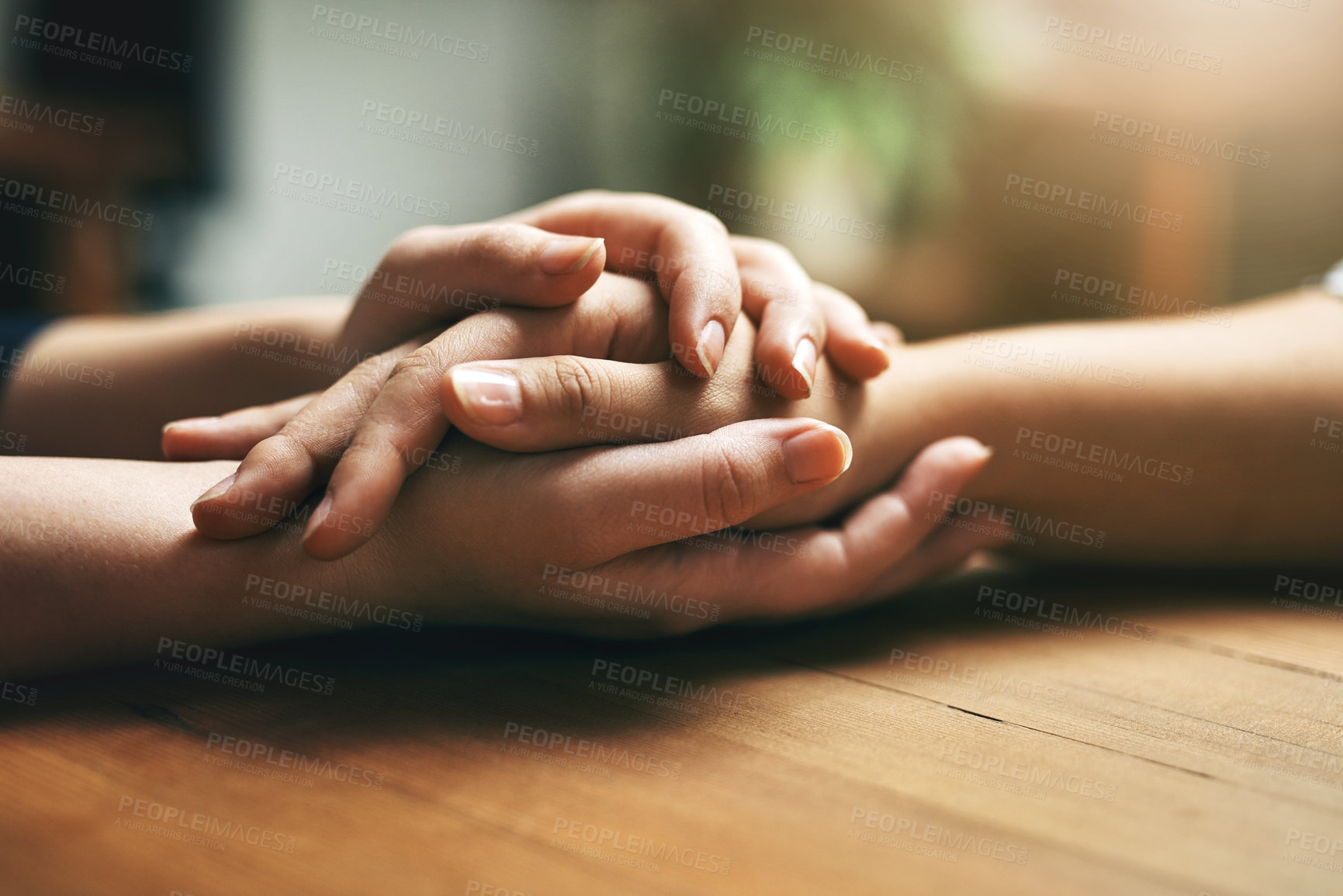 Buy stock photo Holding hands, counseling and support of friends, care and empathy together on table after cancer. Kindness, love and women hold hand for hope, trust or prayer, comfort or compassion, help or unity.