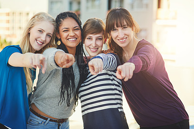 Buy stock photo Portrait of a group of women pointing their fingers at the camera together