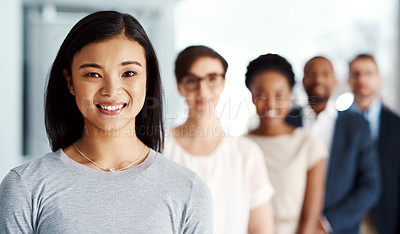 Buy stock photo Happy business woman with team, looking confident and standing with employees at a startup company. Portrait of a manager, boss or female expressing leadership, teamwork and support with coworkers