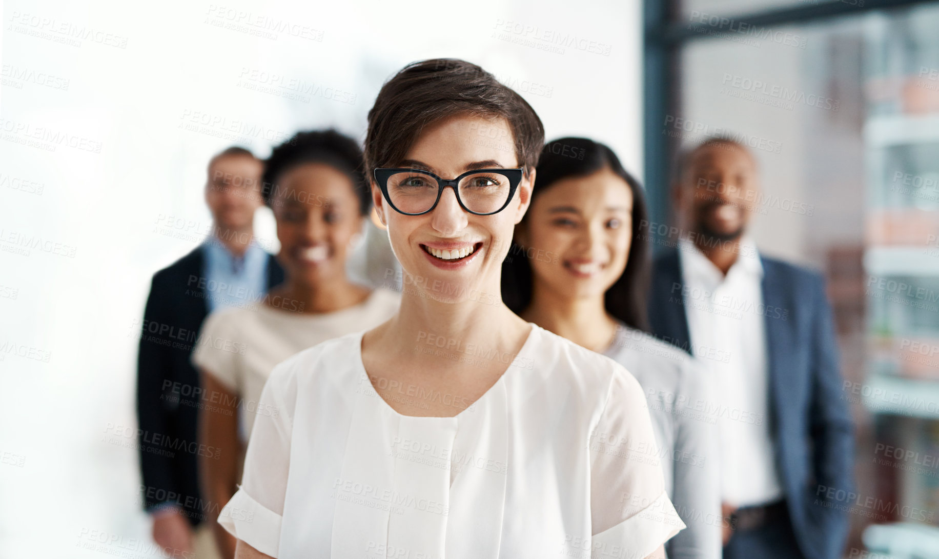 Buy stock photo Business, woman and happy in portrait with team in office for leadership, teamwork and career goals together. Diverse, people and glasses with pride, collaboration and support of startup company