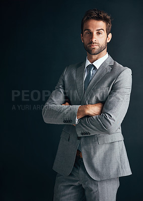 Buy stock photo Businessman, suit and portrait in studio for corporate career,  professional style or business in company. PR manager, serious or confident with organisation or ambition on dark background in mockup
