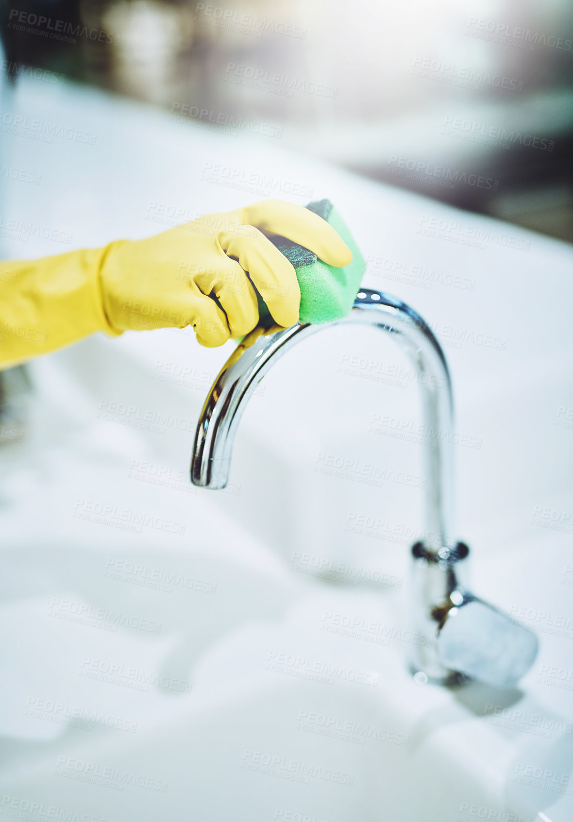 Buy stock photo Cleaning, hand and tap with person in bathroom of home closeup for chores, housework or hygiene. Gloves, scrub and sponge with cleaner in apartment for housekeeping, room service or washing faucet