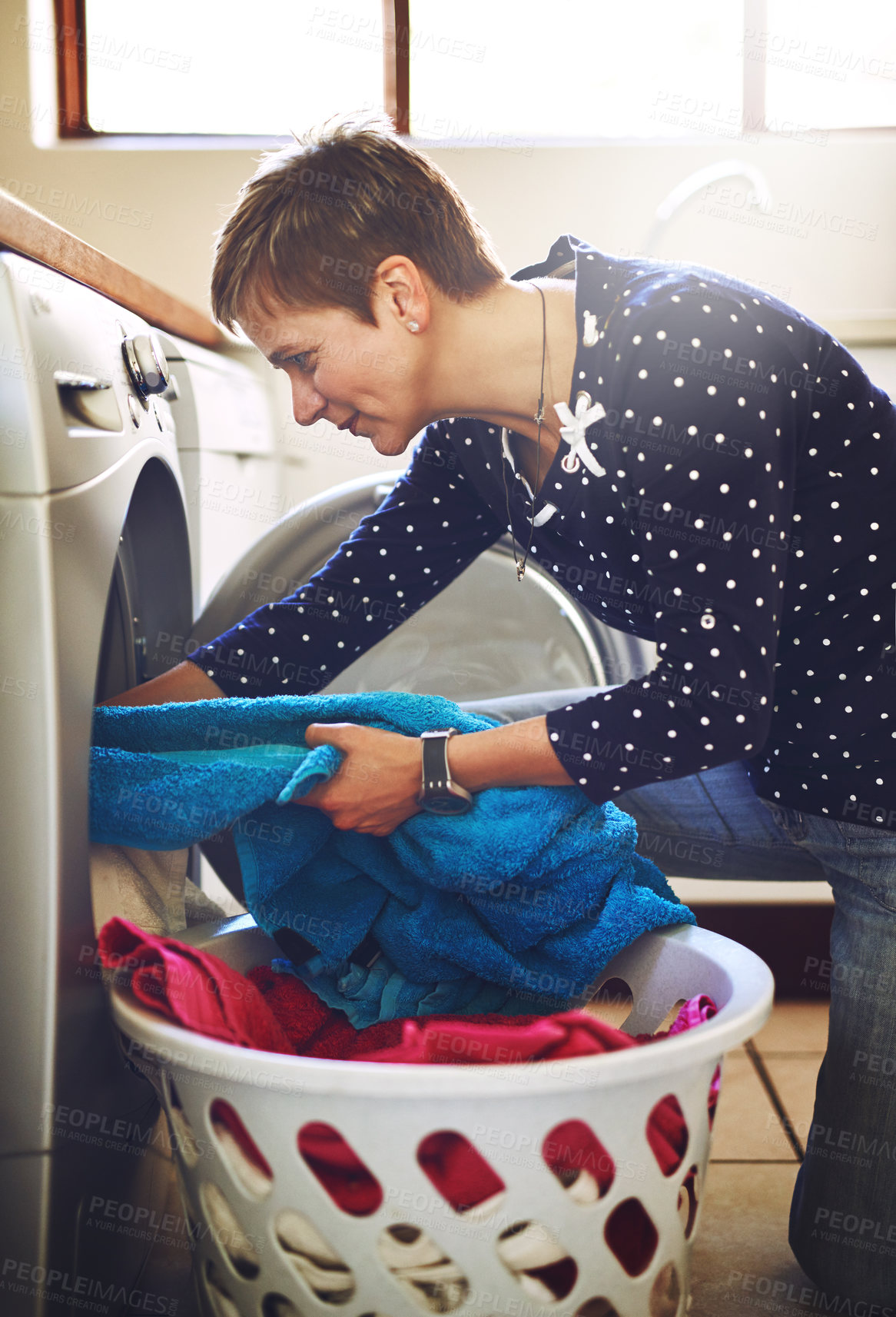 Buy stock photo Woman, washing machine and clothes laundry in home for spring cleaning morning, hygiene or detergent. Female person, basket and housekeeping work with electrical appliance or task, sanitary or towels