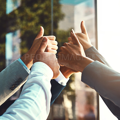 Buy stock photo Diversity, business and hands of group thumbs up in office building for unity with support, trust and yes for collaboration. People, gesture and approval sign for success for partnership and goals.