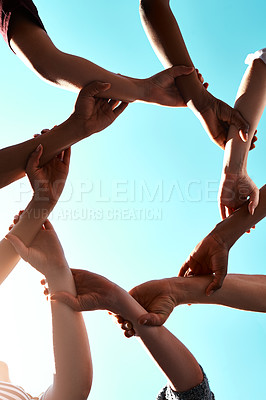 Buy stock photo Hands, link and circle with teamwork and blue sky with low angle, solidarity and trust with arm chain and people together. Team, motivation and connection with group collaboration and community