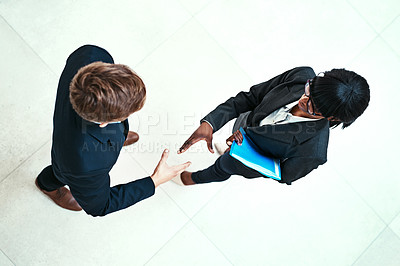 Buy stock photo Handshake, meeting and partnership with business team in office for agreement or deal from above. Corporate, hiring or welcome with man and woman employee shaking hands in workplace for thank you