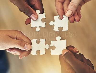 Buy stock photo Team, hands and puzzle for teamwork and collaboration of business people for challenge or project. Above group of men and women working together on mockup jigsaw for solution, synergy or goal