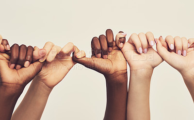 Buy stock photo People, holding hands or thumb together for support, diversity and kindness on studio background. Team or group of friends fingers for unity, promise and solidarity or trust and community diversity