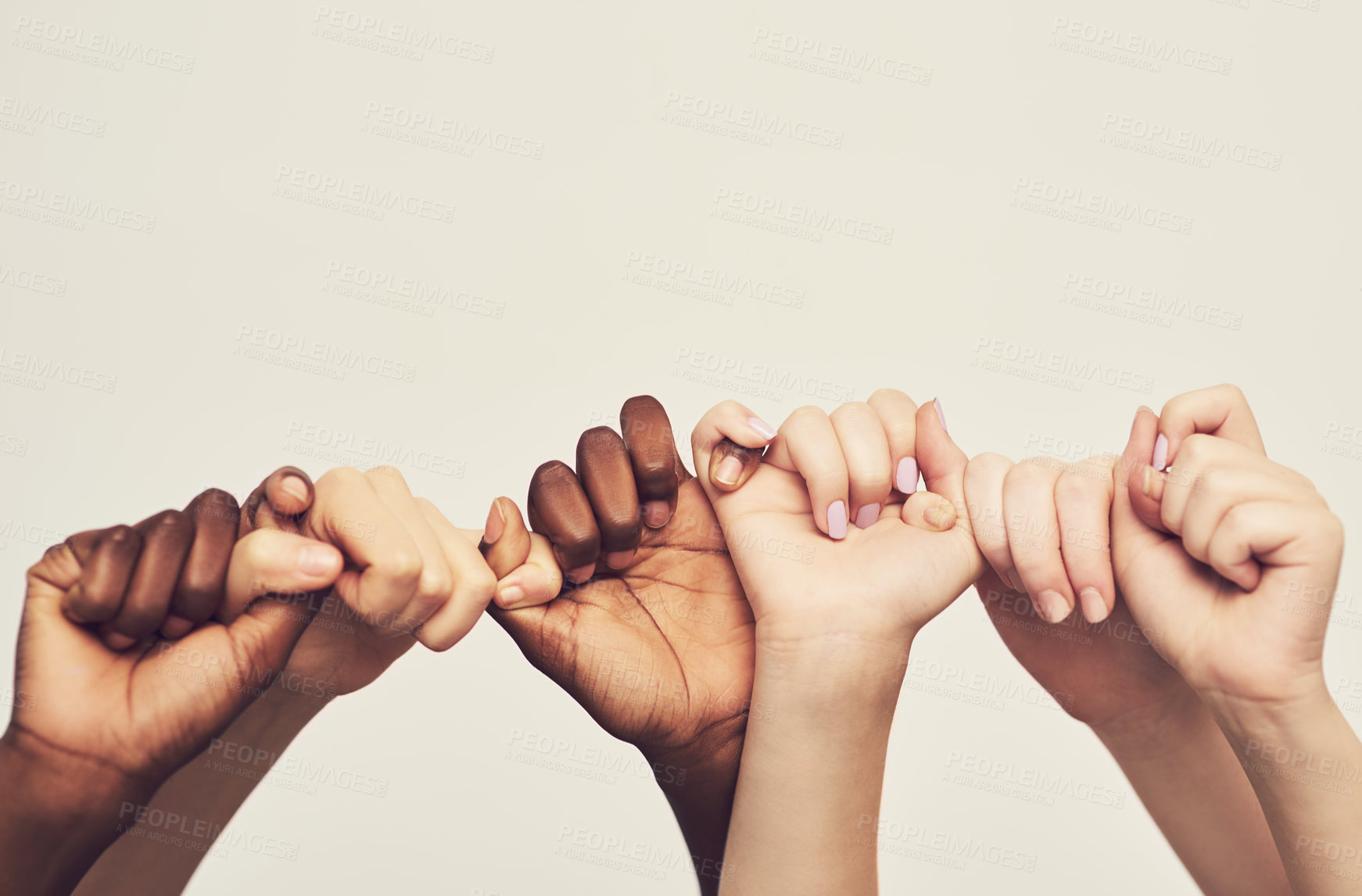 Buy stock photo Mockup, hands and group holding thumb, support and community against a studio background. Zoom, people or friends with teamwork, solidarity or partnership with collaboration, fingers or cooperation