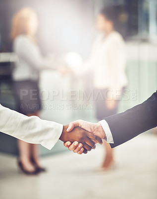 Buy stock photo Deal, shaking hands and colleagues in office for partnership, corporate meeting or interview. Collaboration, team and closeup of business people with handshake for greeting or welcome in a workplace.
