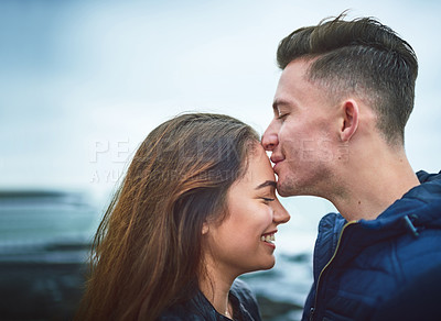 Buy stock photo Shot of a happy young couple spending a romantic day together outdoors