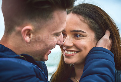 Buy stock photo Shot of a happy young couple spending a romantic day together outdoors