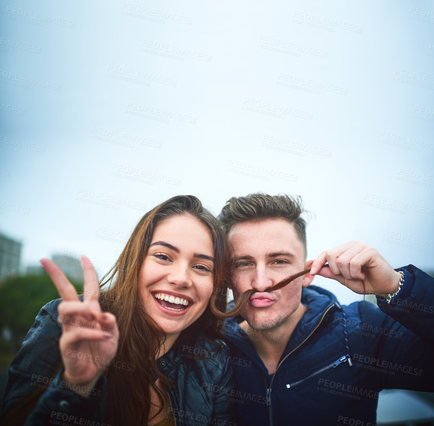 Buy stock photo Playful, couple and portrait with peace sign outdoor for funny memory, hair moustache and bonding together. Woman, man and goofy with hand gesture for love, partnership and care support on city date