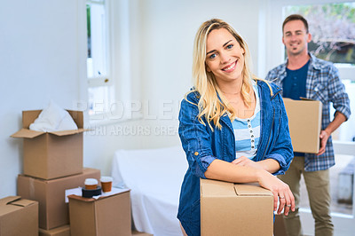 Buy stock photo Portrait of a young couple moving house
