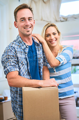 Buy stock photo Portrait of a young couple moving house