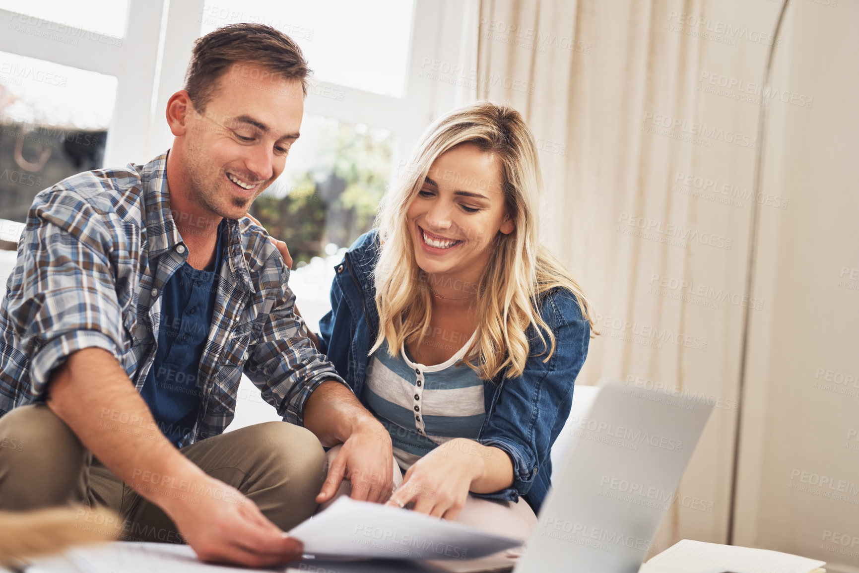 Buy stock photo Document, happy couple and budget planning in home for finance, mortgage application or investment payment. Smile, man and woman with paperwork for savings, banking or reading credit score on laptop