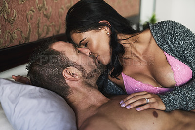 Buy stock photo Couple, home and kissing in bed for affection with love, sexual and bonding or trust. People, relationship and smile in lingerie for romance on valentines day, anniversary and sensual with passion