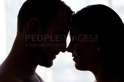 Buy stock photo Home, silhouette and couple with love for bonding, intimacy or connection with affection in relationship. House, man or woman with embrace for admiration, commitment and passion for romance in dating