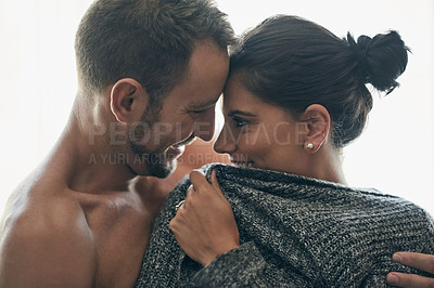 Buy stock photo Happy couple, embrace and kiss bonding in bedroom on weekend for rest, relax or break with love. Woman, man and intimate for romance, together and relationship for comfort, care and affection in home