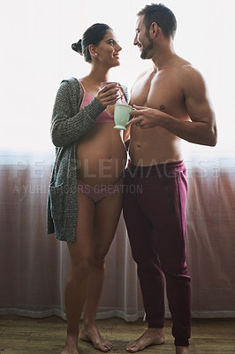 Buy stock photo Couple, pregnant woman and kiss in bedroom for prenatal care, bonding and love of pregnancy development. Man, wife and stomach with underwear, healthy maternity and coffee break together at house