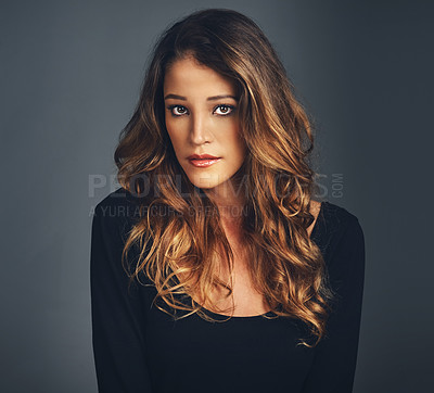 Buy stock photo Woman, portrait and haircare or beauty in studio with facial makeup, serious or cosmetics with fashion. Model, person and healthy hair with shampoo treatment, dermatology and glow on black background