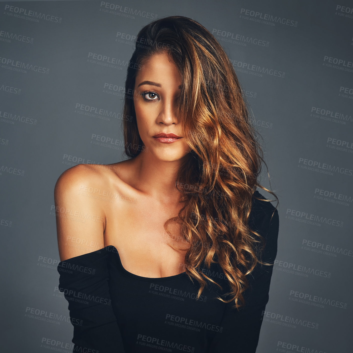 Buy stock photo Woman, face and haircare or serious in studio with confidence, facial makeup or cosmetics with fashion. Model, portrait or healthy hair with shampoo treatment, dermatology or glow on black background