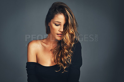 Buy stock photo Woman, face and hair care in portrait for fashion, natural brazilian treatment in studio. Female model, smile and skin glow or shine with aesthetic makeup style with salon results on gray background