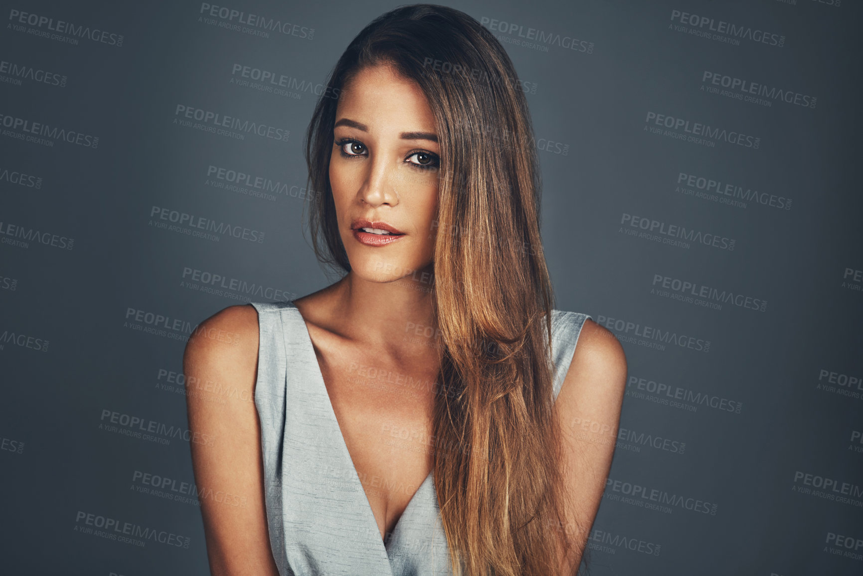 Buy stock photo Hair care, beauty and portrait of woman in studio for natural cosmetics, shine and luxury glow on gray background. Elegant, hairstyle and female model for salon treatment, volume or texture growth