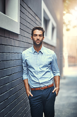 Buy stock photo Fashion, businessman and portrait in city by wall with corporate style, trendy and sophisticated look. Male entrepreneur, professional and serious in street for travel to work or company and outdoor.