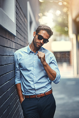 Buy stock photo Man, fashion and sunglasses in urban area for professional, vision and designer eyewear. Male person, working and business style in city for creative company, outfit and entrepreneur in street.