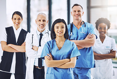 Buy stock photo Team, healthcare and portrait of doctors with nurses in hospital with arms crossed for leadership or support. Diversity, smile and proud face of medical group in solidarity or service collaboration