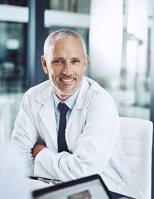 Buy stock photo Healthcare, portrait and senior doctor at desk with smile, pride and hospital management for support in clinic. Health care boss, happiness and medicine, happy man medical professional in office.