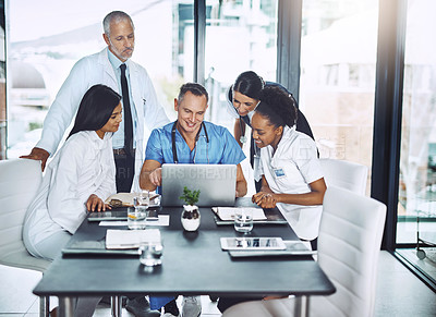 Buy stock photo Doctor, diversity and laptop in team meeting for healthcare strategy, planning and collaboration in a hospital. Group of doctors, teamwork and discussion on computer technology with medical students