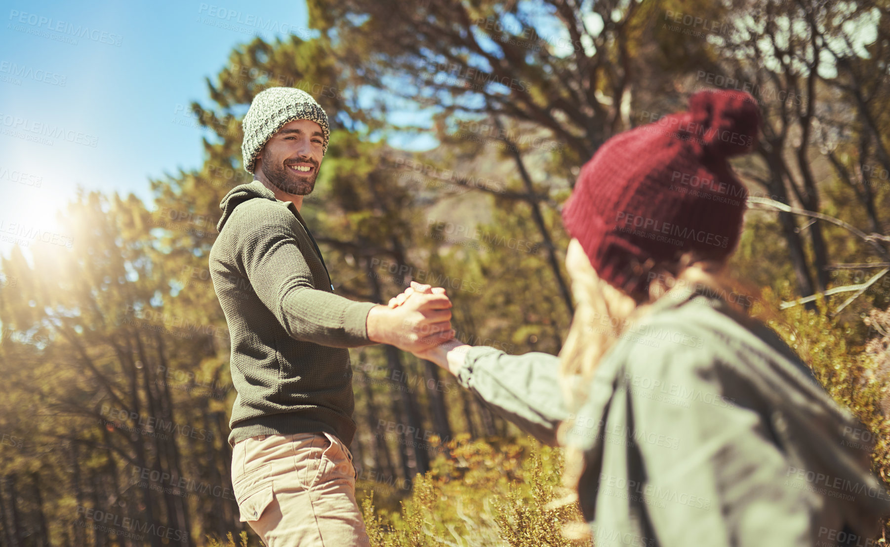 Buy stock photo Climbing, help and happy man for hiker couple outdoor in mountains together for exercise or hobby. Challenge, hiking and teamwork with people in nature for adventure, fitness or weekend workout