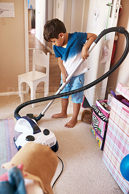 Buy stock photo Child, floor and vacuum for cleaning in bedroom, house and at home for child development and growth. Lens flare, youth and machine for responsible housekeeping, learning and chores for hygiene