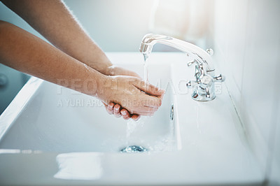 Buy stock photo Hands, water and washing for clean and safe skin for wellness in the bathroom at home. Wash hand, woman and liquid for skincare, bacteria, cleaning and disinfection for germs with safety at house.