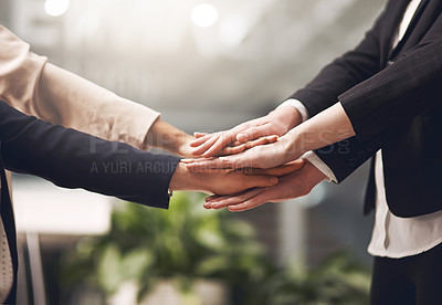 Buy stock photo Hands, unity and support in the business office while motivating each other showing support and togetherness. Team of businesspeople in a circle and celebrating their success together at work