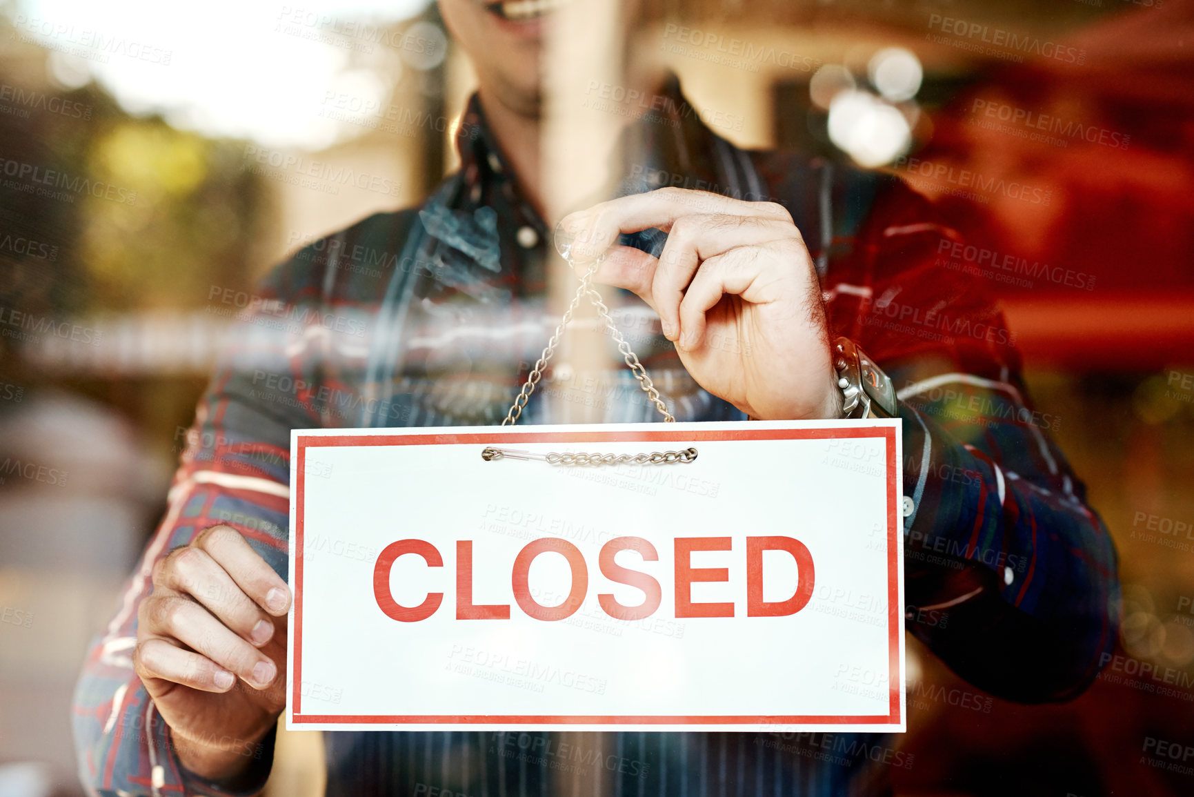 Buy stock photo Closed, sign and waiter at door of cafe for information, small business and notification of service. Coffee shop, person and smile with board by window for restaurant, hospitality and end of work day