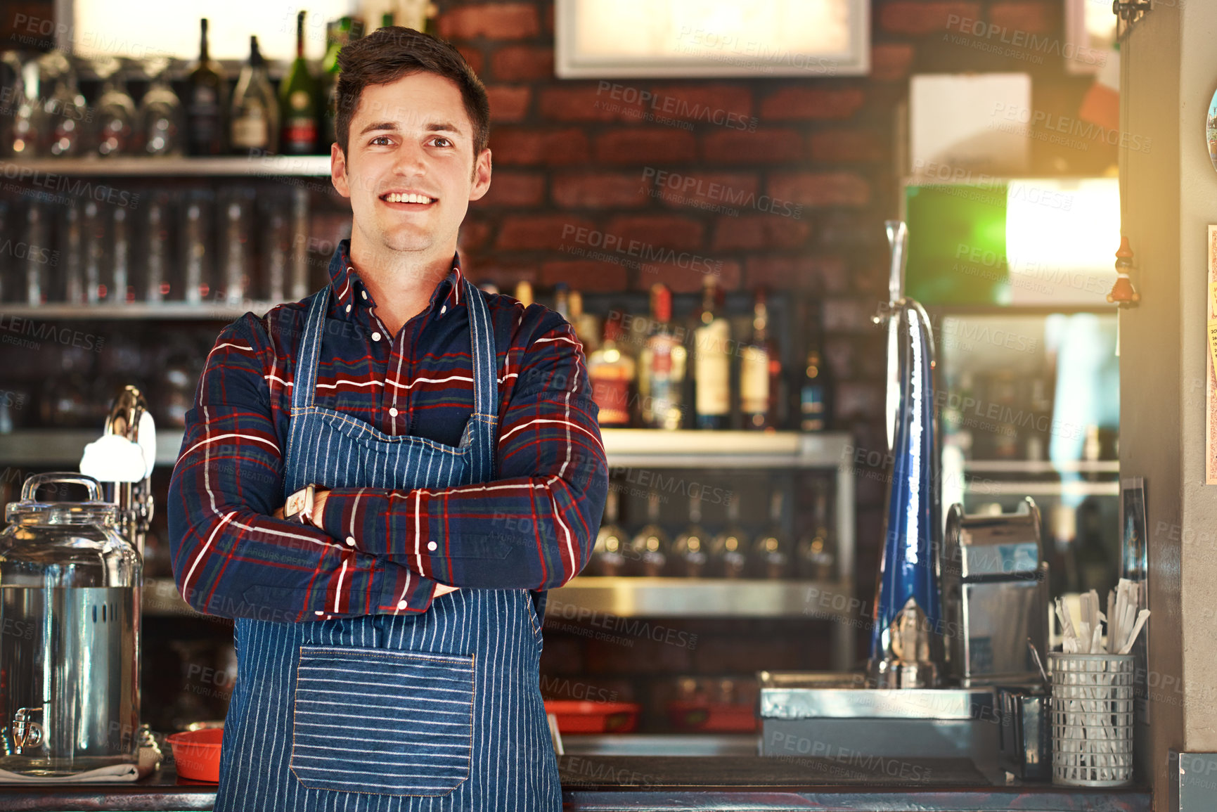 Buy stock photo Man, portrait and smile with confidence, pizzeria and small business startup for restaurant. Chef, entrepreneur and arms crossed for bistro, food and service industry owner in New York cafe in apron