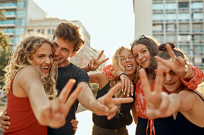 Buy stock photo Happy people, portrait or friends with peace sign in city for holiday, weekend or social event. Young, group and teenagers with smile, emoji or vote for friendship, bonding or moment in an urban town