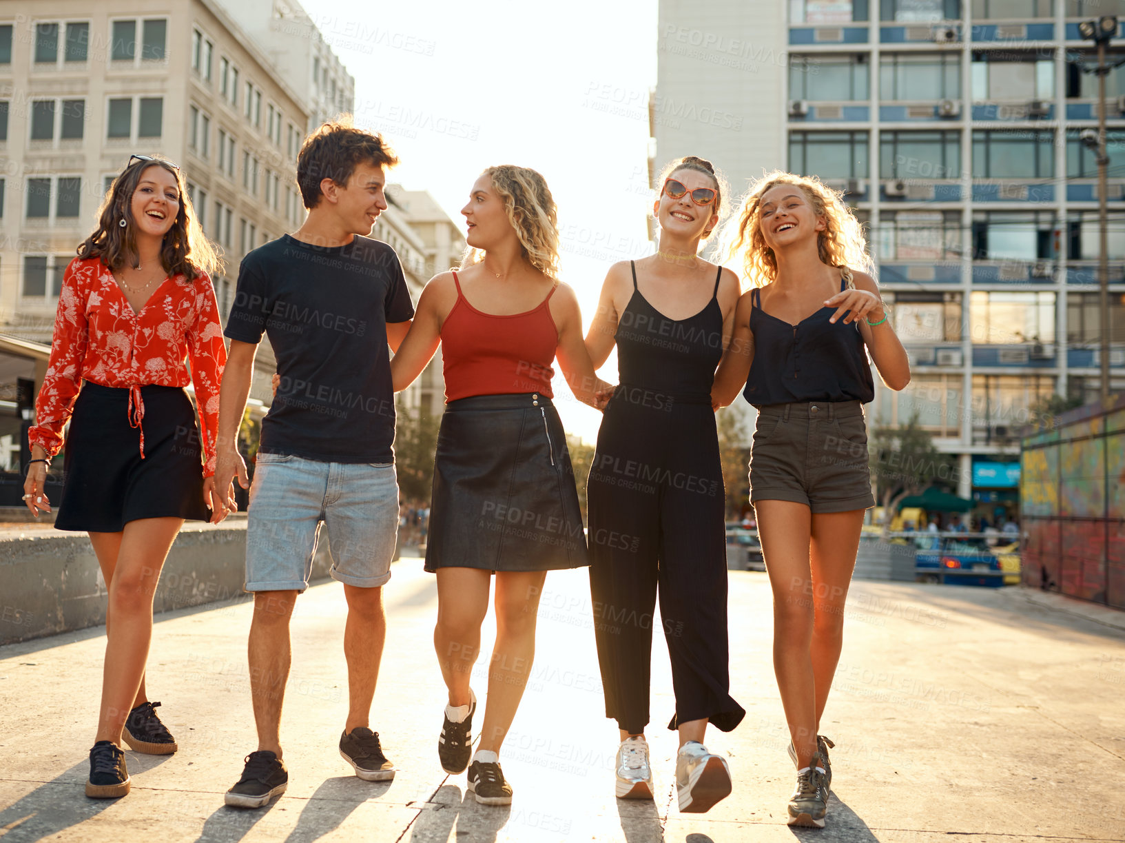 Buy stock photo Group, people and walking in city for street fashion or style with solidarity, unity and outdoor. Friends, trendy and together for happiness, freedom and bonding on weekend as gen z or students in UK