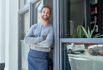 Buy stock photo Barista, small business and portrait of man with arms crossed at cafe for service, welcome or working. Smile, entrepreneur and male person with apron at coffee shop entrance, doorway or front door