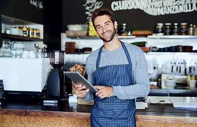 Buy stock photo Waiter, cafe and portrait of man with tablet checking online review, web or tech in coffee shop. Networking, smile and welcome, restaurant manager or small business owner on digital app for service