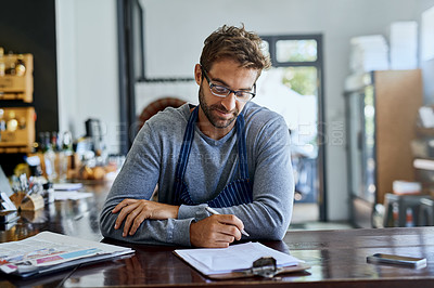 Buy stock photo Coffee shop, worker and man with clipboard in restaurant for stock, inventory and price list. Cafe, small business and waiter with documents on table for planning, feedback and review of store