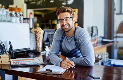 Buy stock photo Happy man and coffee shop owner with documents or schedule for planning menu or recipes in cafe. Male entrepreneur, smile and paperwork in portrait for research, ideas and vision for restaurant 