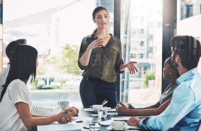 Buy stock photo Woman, manager and business meeting in office with collaboration, ideas or communication with employees. Female speaker, teamwork or company with table for brainstorming, review of global sales