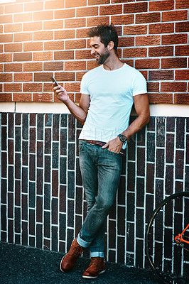 Buy stock photo Thinking, happy and man in city with smartphone for mobile communication, urban life and chatting. Person, phone and online for conversation and connection for travel plans, social media and meme.