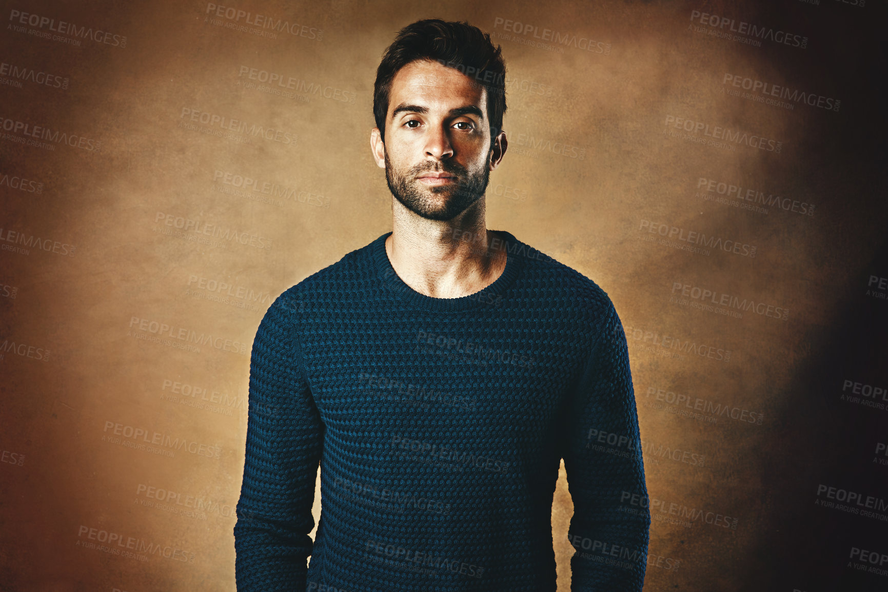 Buy stock photo Portrait, serious and man in studio, fashion and warm in winter, confidence and sweater for aesthetic. Proud, person and background of wall, model and cool with trend, stylish and jersey for clothes