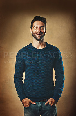 Buy stock photo Portrait, sweater and man in studio, smile and warm in winter, confidence and fashion for aesthetic. Proud, person and background of wall, model and cool with trend, stylish and jersey for clothes
